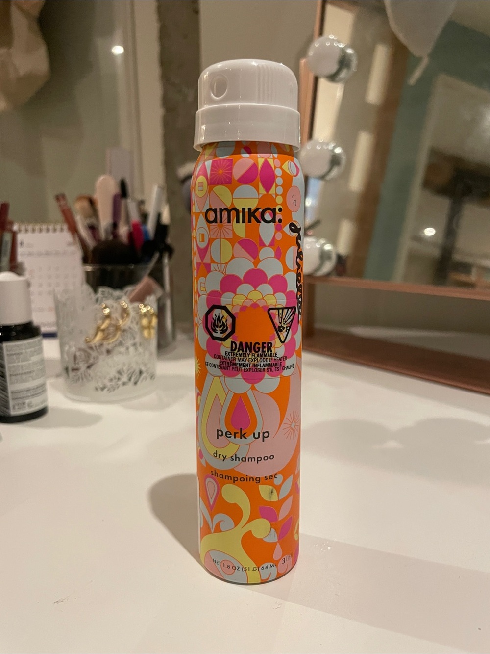 amika Perk Up Dry Shampoo — Orange, Pink, Yellow Patterned Can